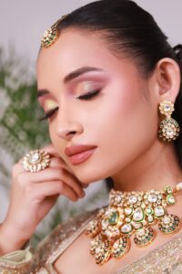 bride wearing traditional necklace with earrings